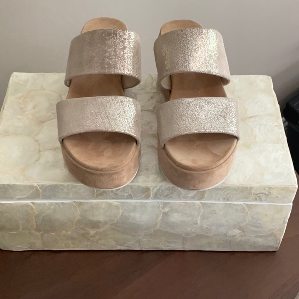muted gold/silver sandal. molded for comfort. 2” platform. Leather lined.